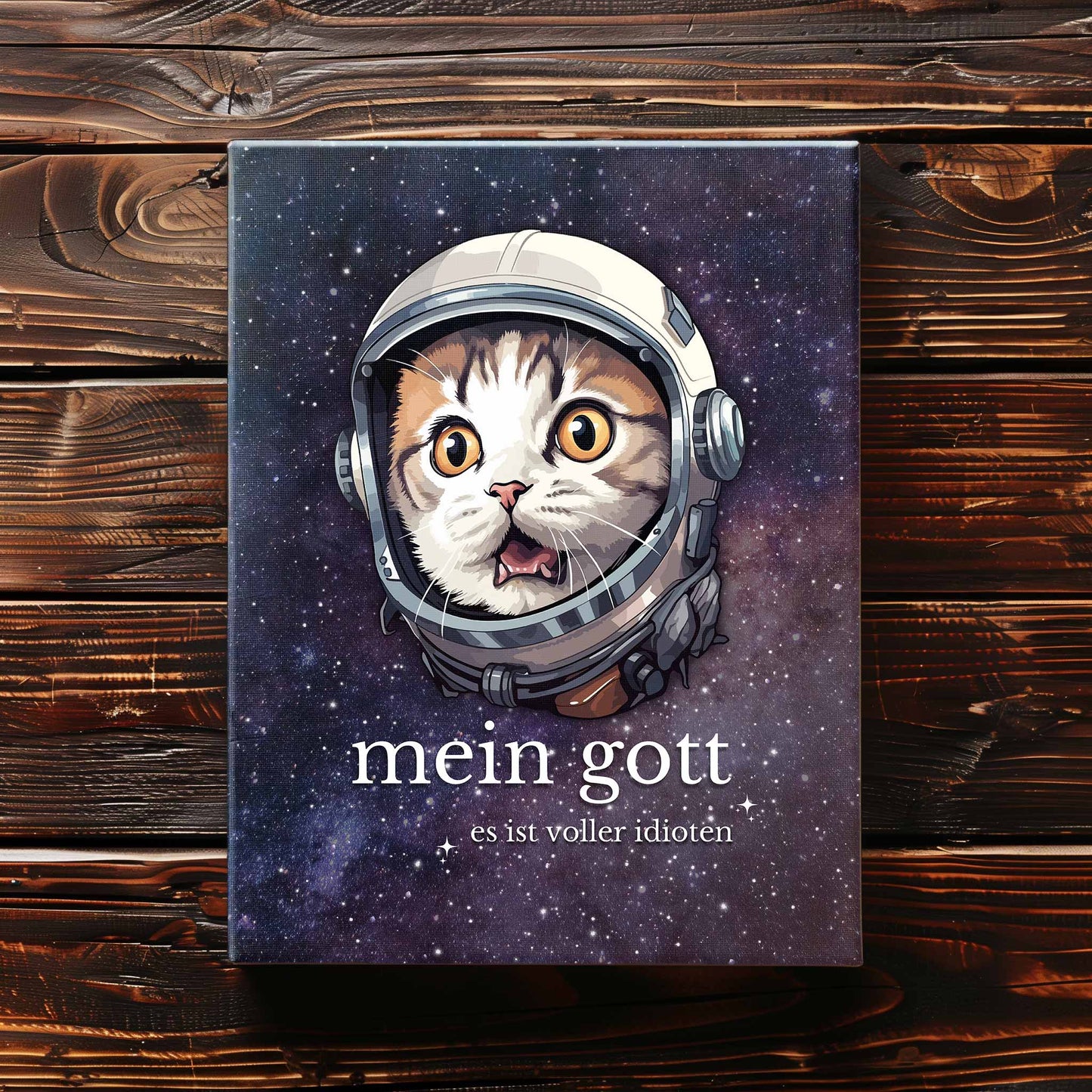 30x40 cm große Leinwand auf Holzboden mit Design einer Katze im Astronauten-Anzug und dem lustigen Spruch 'Mein Gott - Es ist voller Idioten'