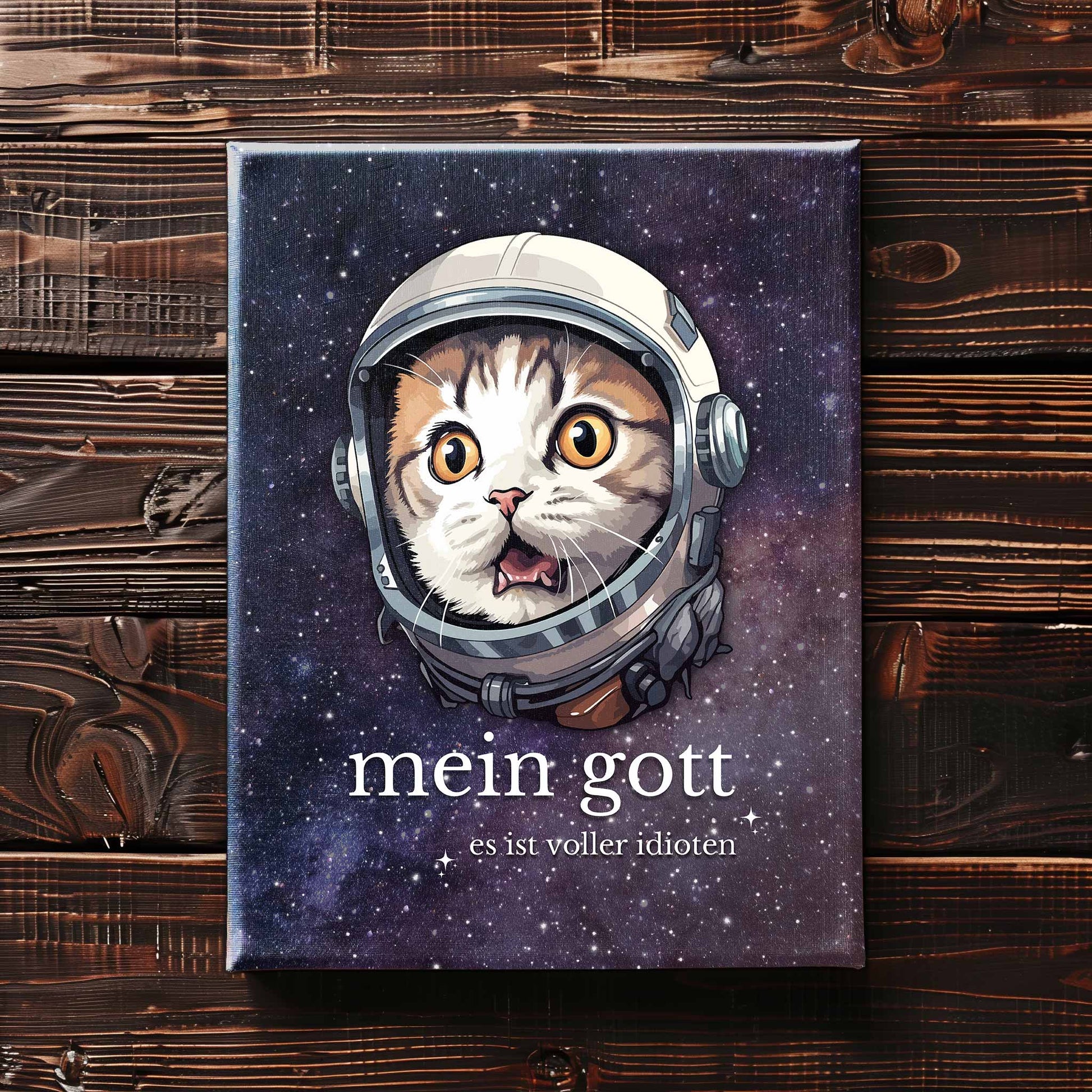 60x80 cm große Leinwand auf Holzboden mit Design einer Katze im Astronauten-Anzug und dem lustigen Spruch 'Mein Gott - Es ist voller Idioten'