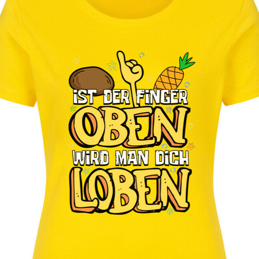 Nahaufnahme eines gelben Damen T-Shirts mit "Ist der Finger oben, wird man Dich loben" Cartoon-Design